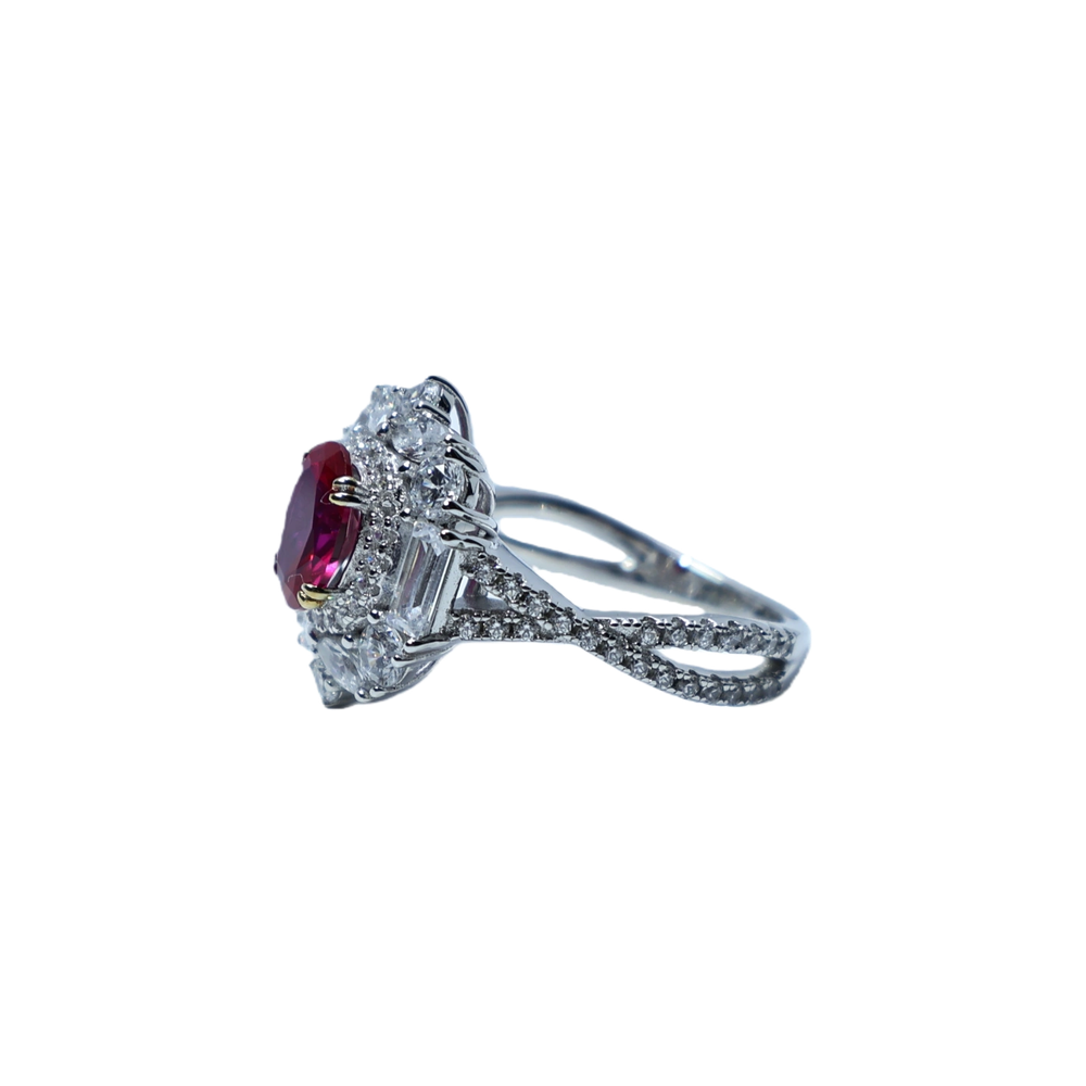 Garnet, moissanite, and blue spinel navel-shaped flower ring
