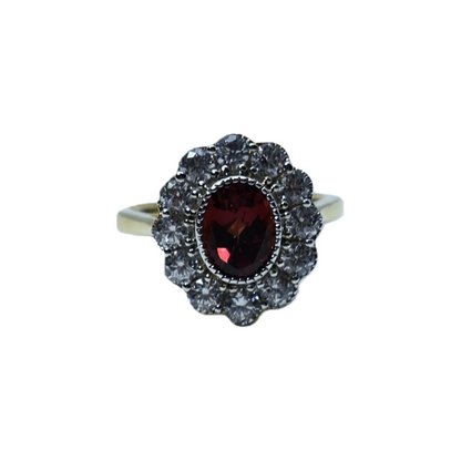 Garnet, moissanite, and blue spinel navel-shaped flower ring