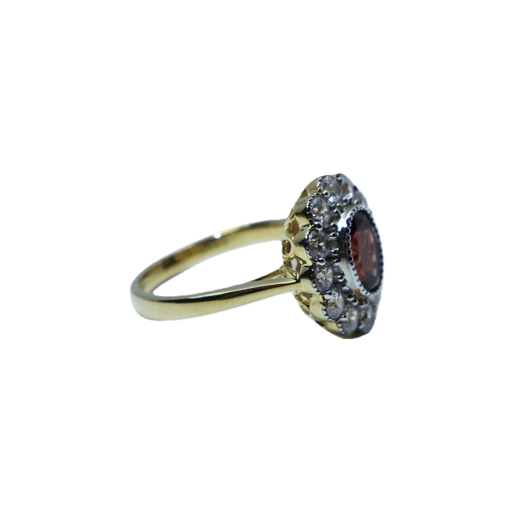Garnet, moissanite, and blue spinel navel-shaped flower ring