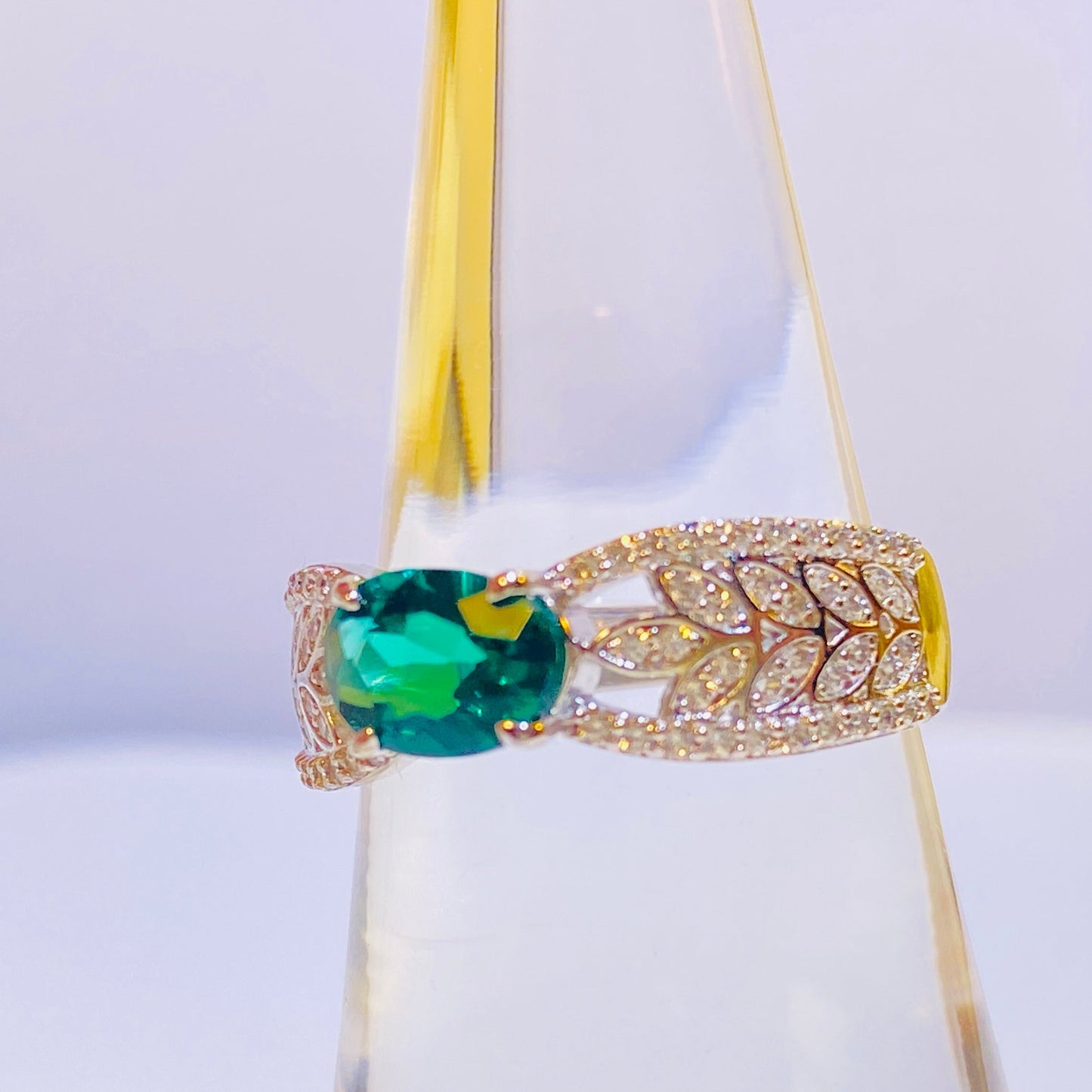 A perennial favorite among our European and American clients, this classic ring features a stunning 5x7mm oval lab-grown emerald. Its timeless and elegant design is crafted from sterling silver and finished with a brilliant 18K white gold plating, making it a sophisticated choice that beautifully complements any skin tone. A must-have for any curated jewelry collection.