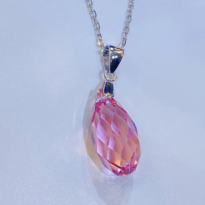 Introduce this elegant teardrop pendant necklace to your collection. It features a premium, precision-cut pink crystal with a stunning clarity and sparkle inspired by top European crystal houses. Crafted from durable 925 sterling silver, this piece offers a sophisticated, luxurious aesthetic. A high-quality, fashionable choice for B2B buyers seeking timeless yet on-trend accessories.