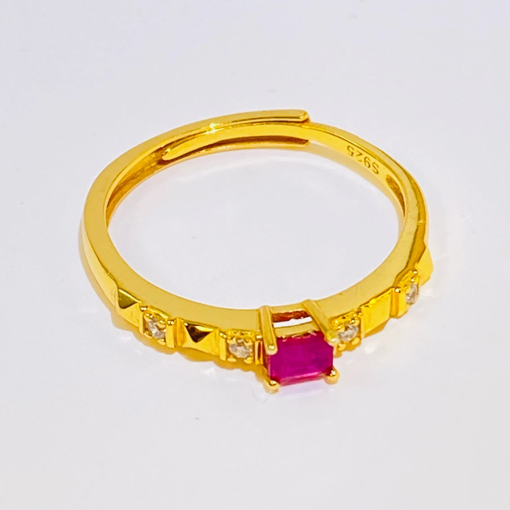 Elevate your collection with this elegantly minimalist ring featuring a natural, untreated square ruby. Crafted from sterling silver and finished with a luxurious gold plating, this piece combines timeless style with modern simplicity. It's the perfect choice for wholesale buyers seeking high-quality, authentic gemstones in a fashionable, streamlined design.