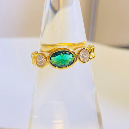 A best-selling design in the US and Europe, this trendy ring features a captivating 5x7mm oval lab-grown emerald. Its timeless appeal is crafted from sterling silver and finished with a brilliant 18K gold plating. The classic yet modern aesthetic is a flattering choice that beautifully complements any skin tone, making it a must-have for a curated jewelry collection.