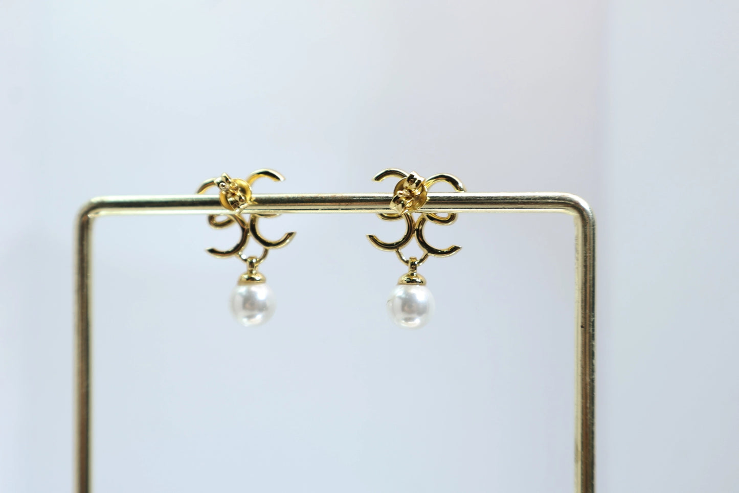 Chanel-style double C pearl earrings