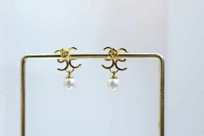 Chanel-style double C pearl earrings