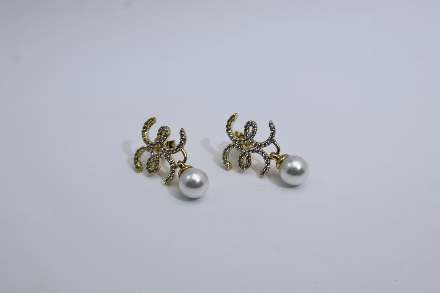 Chanel-style double C pearl earrings