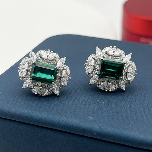 Emerald green drop earrings worn on ear gold plated supplier