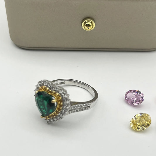 Heart shaped emerald ring worn on hand gold plated supplier