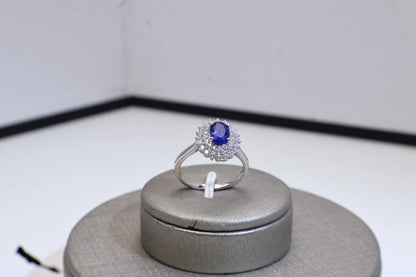 Oval Blue Spinel Halo Engagement Ring in White Gold Plated Silver