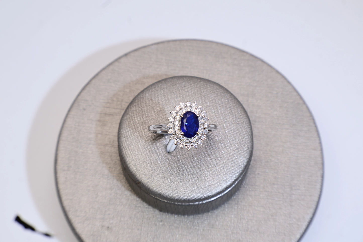 Oval Blue Spinel Halo Engagement Ring in White Gold Plated Silver