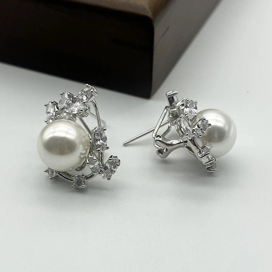 Elegant pearl earrings worn on ear 925 silver gold plated supplier