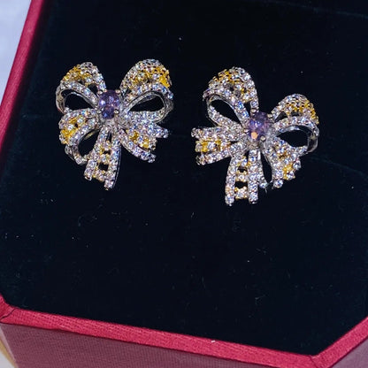 Elevate your collection with our stunning butterfly stud earrings. They feature genuine natural amethyst and sparkling 5A white zircon, beautifully arranged in a refined, two-tone plated design. This unique combination highlights an elegant aesthetic, making them a must-have for discerning B2B jewelry buyers.