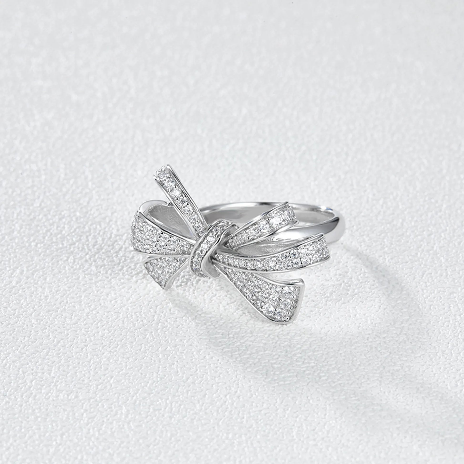 Bow ring worn on hand gold plated supplier