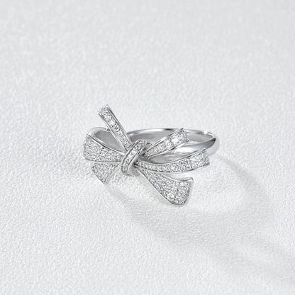 Bow ring worn on hand gold plated supplier