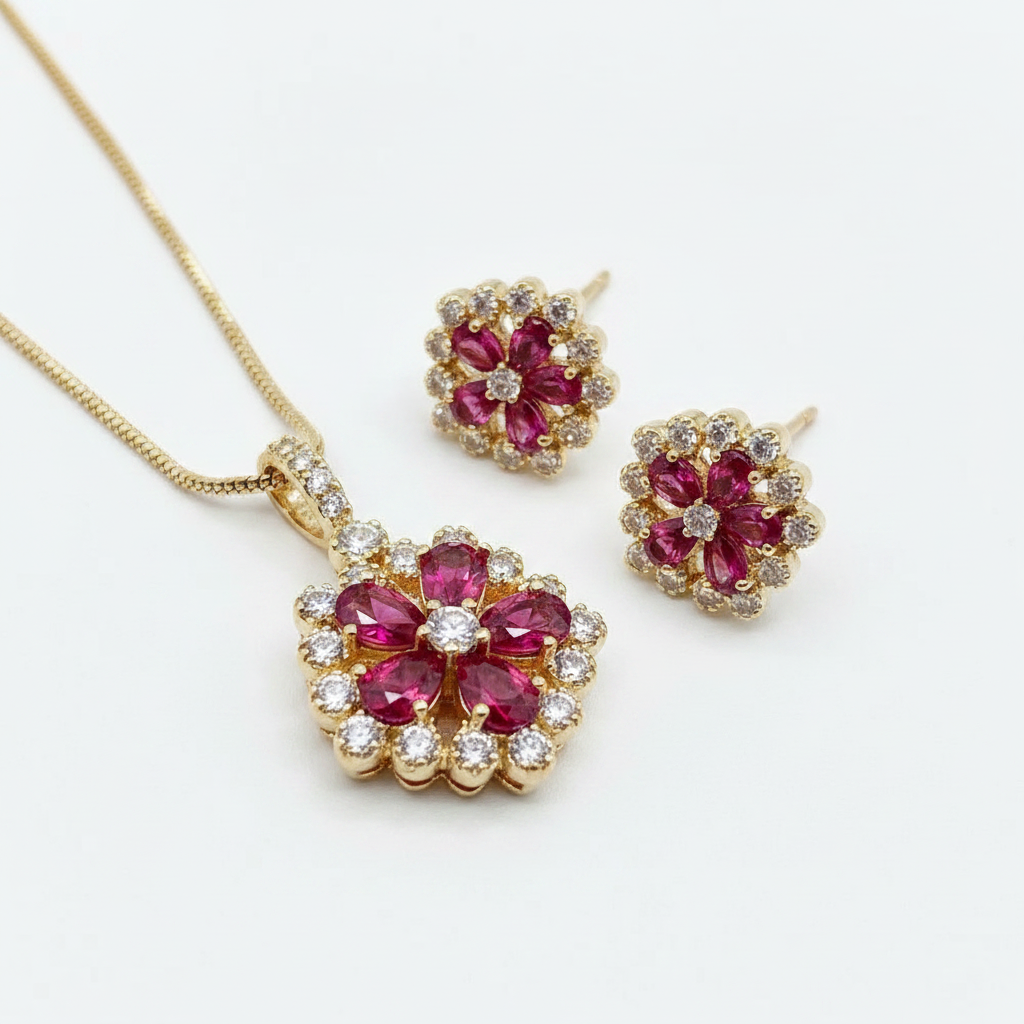 Ruby red flower CZ pendant necklace hanging on gold snake chain with matching stud earrings, side detail view