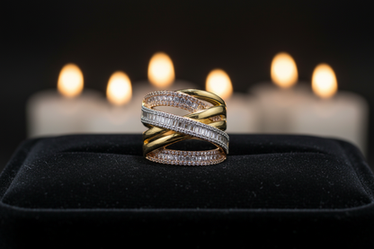 Tri-color gold crossover wave ring on black velvet tray, luxury Middle East jewelry scene, Bo Cheng Jewelry