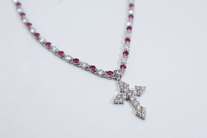 necklace with a full diamond chain and a cross.
