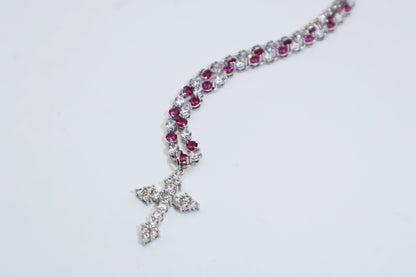 necklace with a full diamond chain and a cross.
